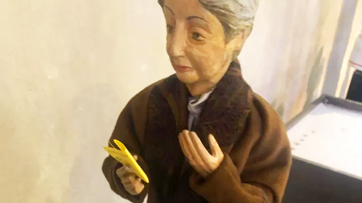 Impf-Propaganda in der Kirche: Krippenfiguren mit gelbem Impfpaß